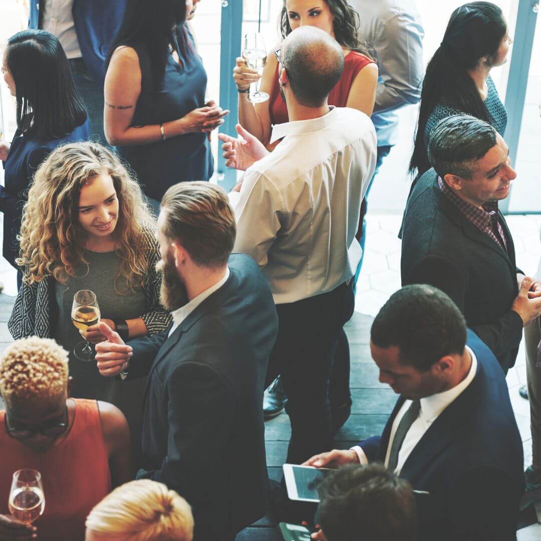 Group of people at a networking event making connections